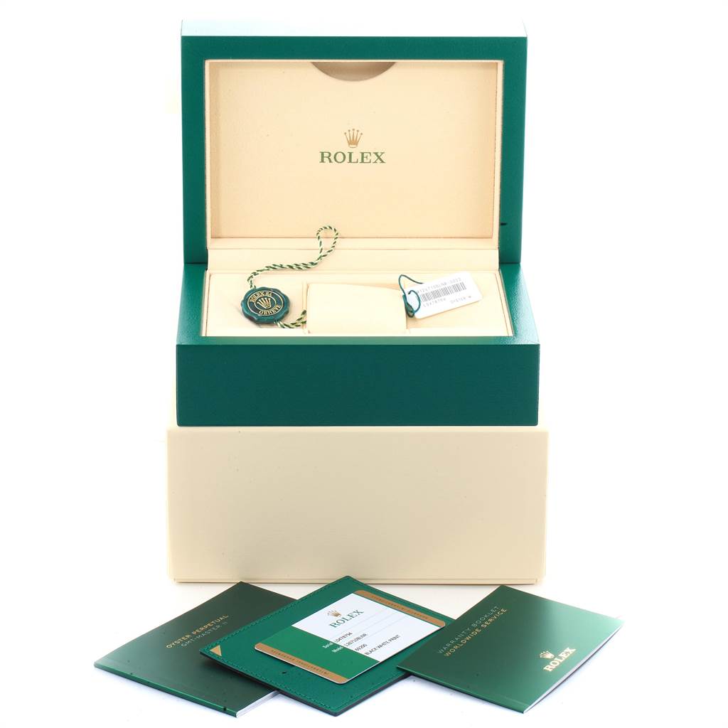 The image shows the packaging for a Rolex GMT-Master 126710 Men's Stainless Steel Black Dial 126710 Men's Stainless Steel Black Dial watch, including the inner box, tags, and authentication booklets.