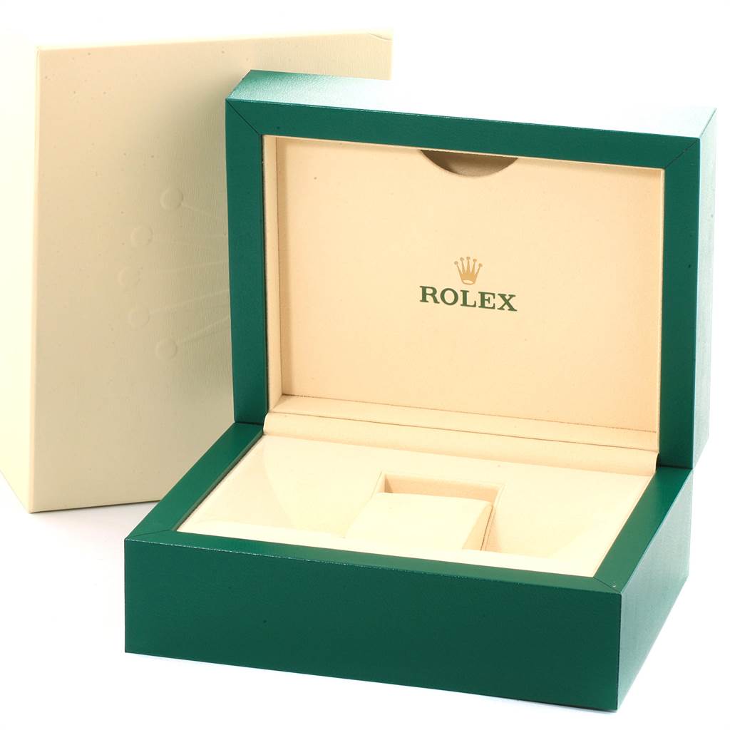 This image shows the open green and cream-colored box of a Rolex GMT-Master 116719 Men's White Gold Black Dial 116719 Men's White Gold Black Dial model, displaying the inside of the packaging.