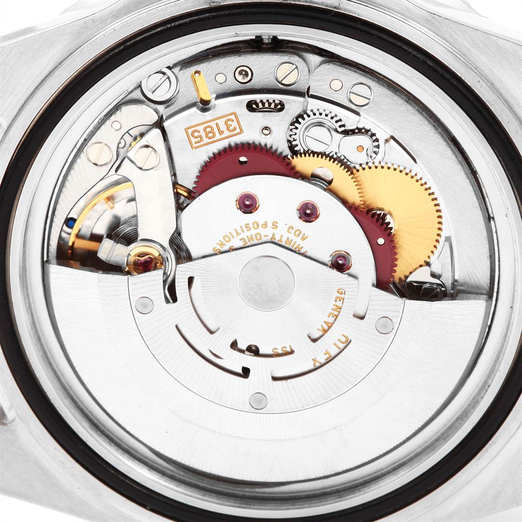 This image shows the internal mechanism of the Rolex GMT-Master 16710 Men
s Stainless Steel Black Dial 16710 Men
s Stainless Steel Black Dial, focusing on the movement and gears.