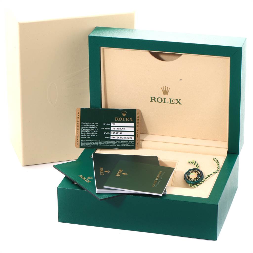 The image shows the packaging, warranty card, manuals, and accessories for a Rolex GMT-Master 116710 Men's Stainless Steel Black Dial 116710 Men's Stainless Steel Black Dial watch, without the actual watch visible.