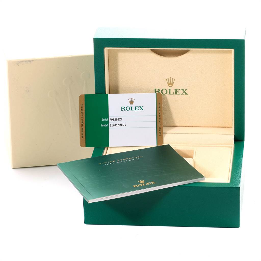 The image shows the box, documentation, and warranty card for a Rolex GMT-Master 116710 Men's Stainless Steel Black Dial 116710 Men's Stainless Steel Black Dial watch, but the watch itself is not visible.