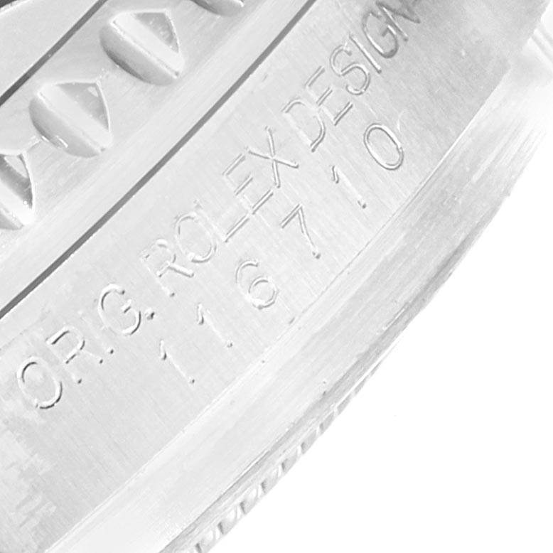 This image shows a close-up of the side of the bezel and the engraved model number of the Rolex GMT-Master 116710 Men's Stainless Steel Black Dial 116710 Men's Stainless Steel Black Dial watch.
