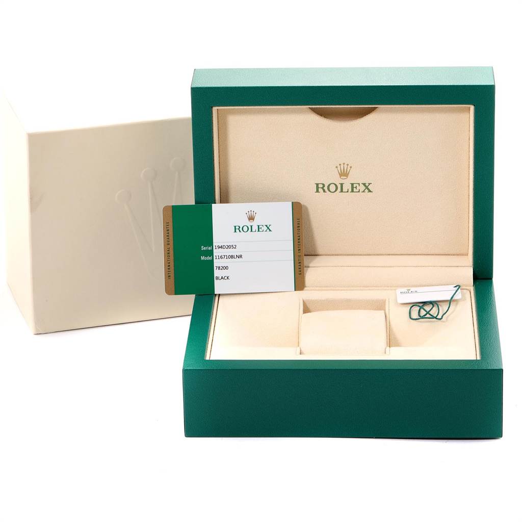 This image shows the box, cushion, and card for a Rolex GMT-Master 116710 Men's Stainless Steel Black Dial 116710 Men's Stainless Steel Black Dial model watch.