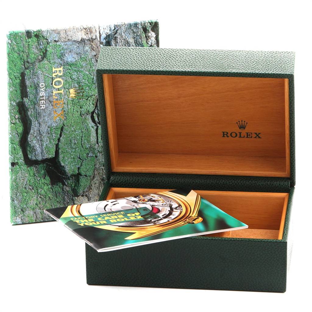 The image shows the open box and manual for the Rolex GMT-Master 16700 Men's Stainless Steel Black Dial 16700 Men's Stainless Steel Black Dial watch.