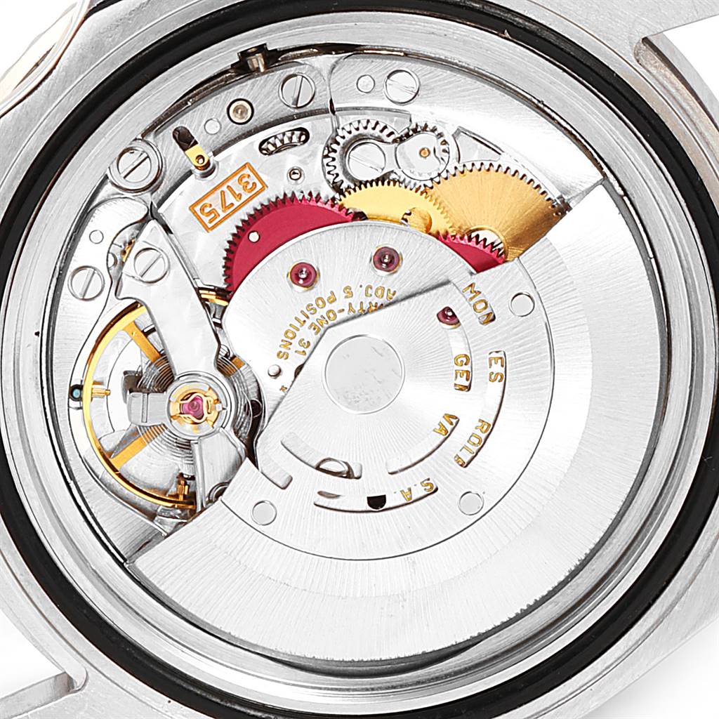 This is a top-down view of the internal mechanisms of a Rolex GMT-Master 16700 Men's Stainless Steel Black Dial 16700 Men's Stainless Steel Black Dial watch, showcasing its intricate movement.