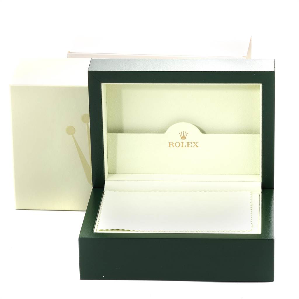 The image shows an empty Rolex GMT-Master 16710 Men's Stainless Steel Black Dial 16710 Men's Stainless Steel Black Dial watch box with a green exterior and beige interior, along with the Rolex logo inside.