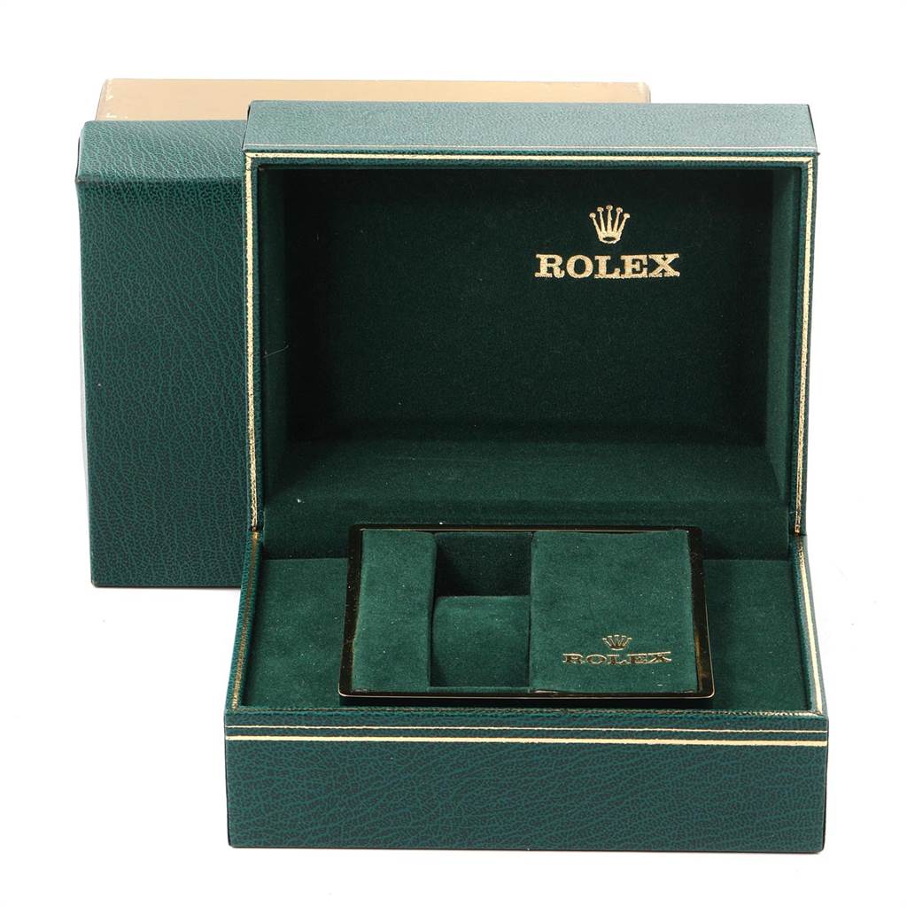 This image shows an open green Rolex presentation box for the GMT-Master model, with no watch present inside.