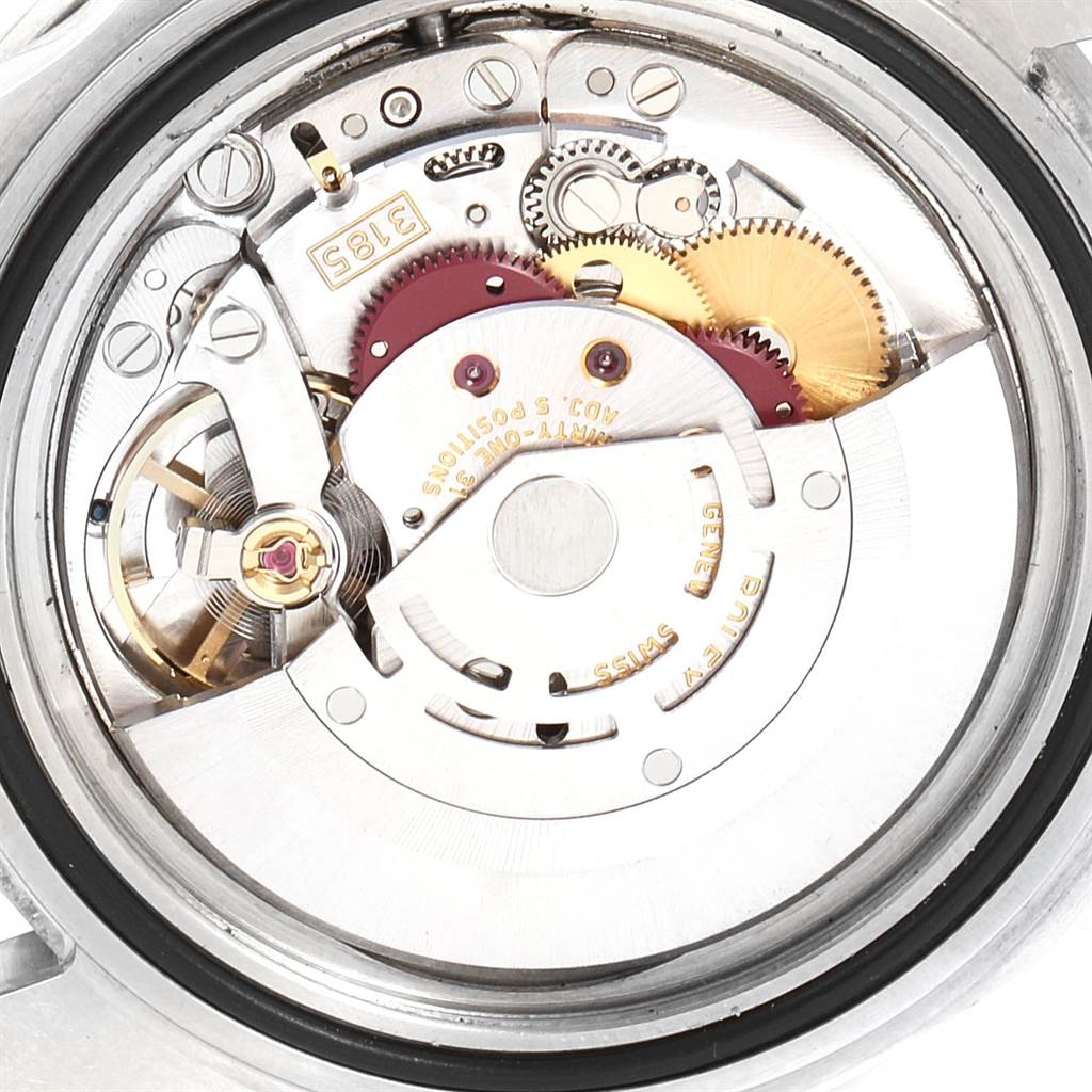 This image shows a close-up of the movement mechanism of a Rolex GMT-Master 16710 Men's Stainless Steel Black Dial 16710 Men's Stainless Steel Black Dial watch.