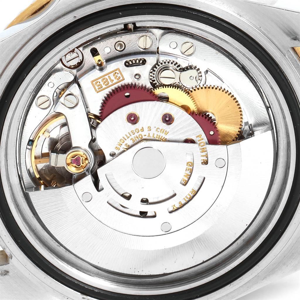 This image shows the internal mechanics, including gears and movement, of the Rolex GMT-Master 16713 Men's Stainless Steel Black Dial 16713 Men's Stainless Steel Black Dial watch from a back view.