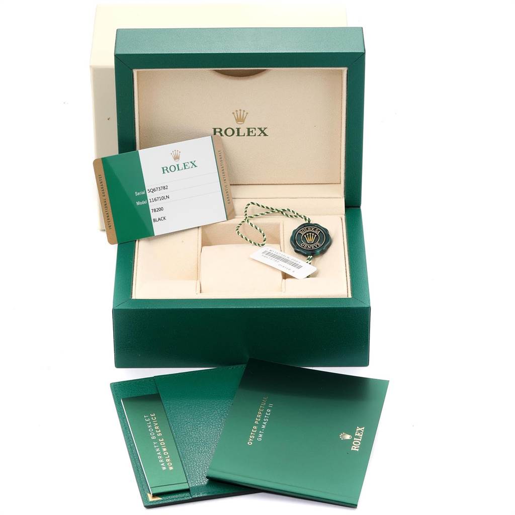 The image shows a Rolex GMT-Master 116710 Men's Stainless Steel Black Dial 116710 Men's Stainless Steel Black Dial watch box, warranty card, tags, and booklets.