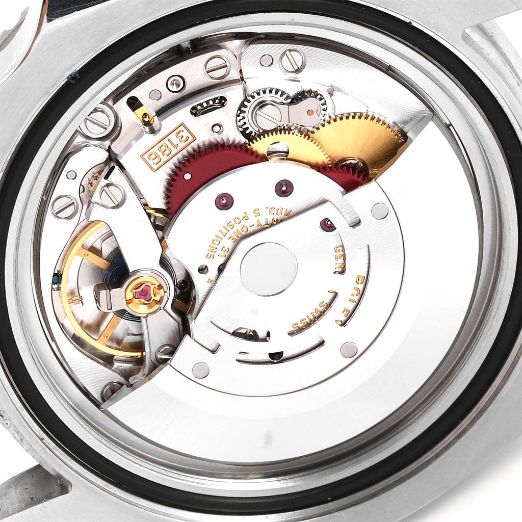 This image shows a close-up view of the movement inside a Rolex GMT-Master 116710 Men's Stainless Steel Black Dial 116710 Men's Stainless Steel Black Dial watch, highlighting its intricate mechanical components.