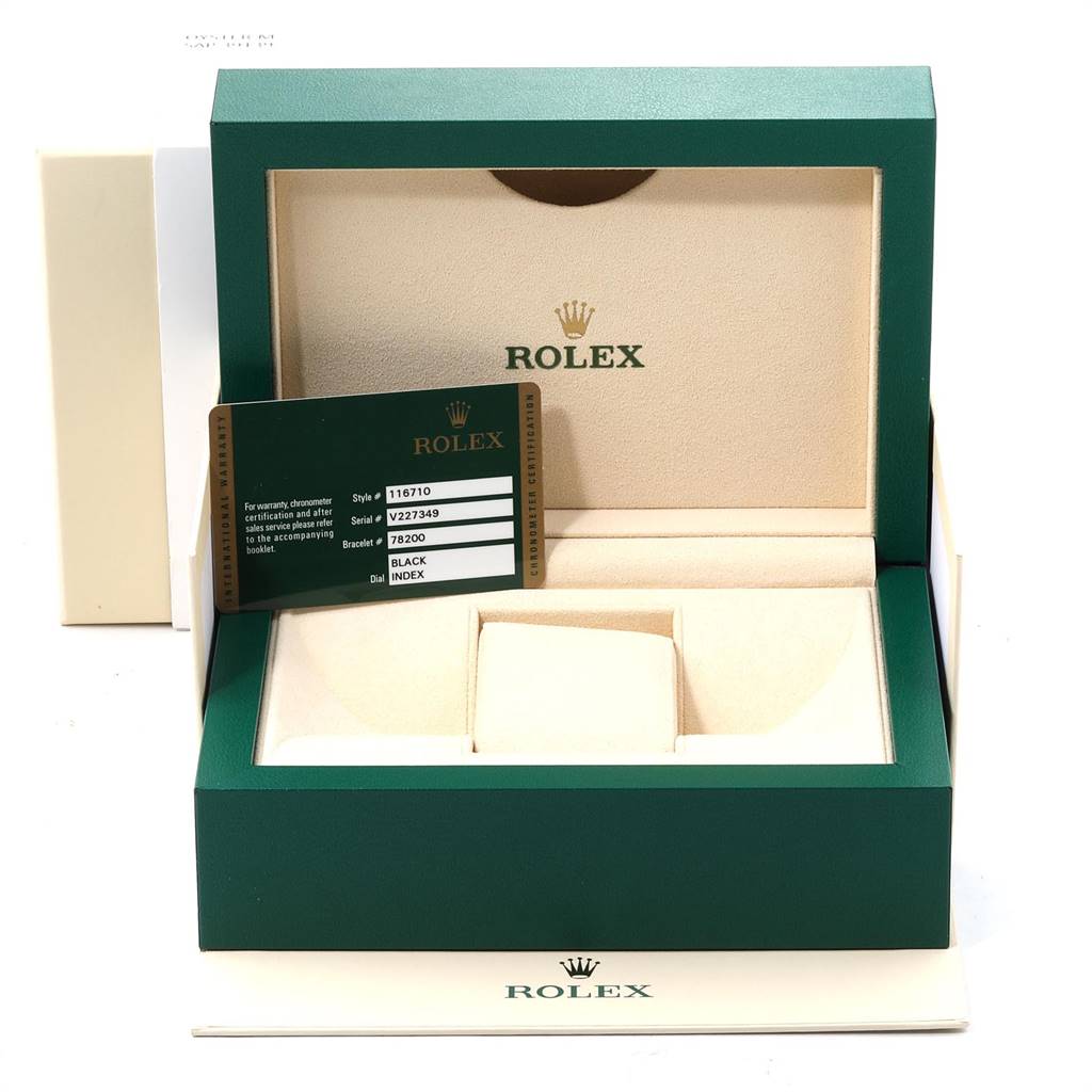 This image shows an open Rolex GMT-Master 116710 Men's Stainless Steel Black Dial 116710 Men's Stainless Steel Black Dial watch box and a certification card at a straight-on angle.