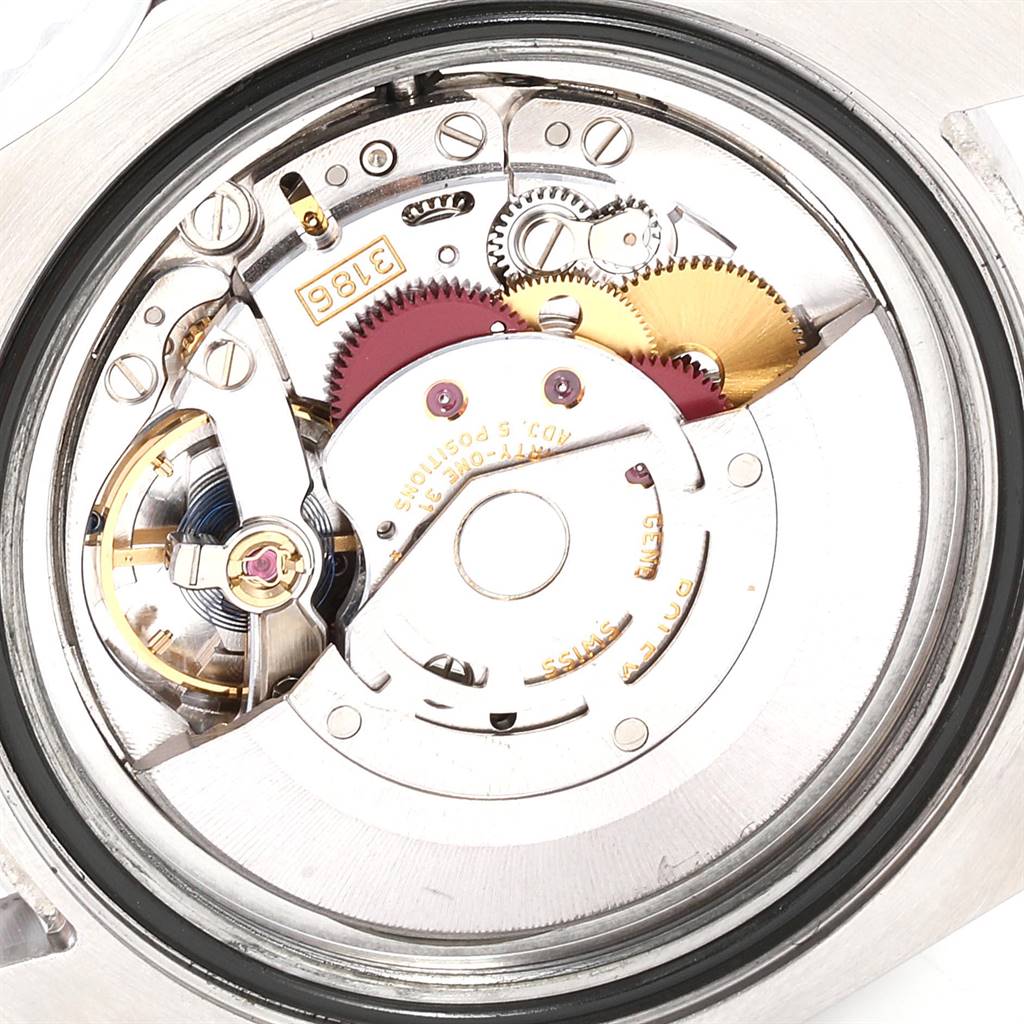 This image shows the internal movement mechanism of a Rolex GMT-Master 116710 Men's Stainless Steel Black Dial 116710 Men's Stainless Steel Black Dial watch from a rear view angle.
