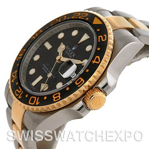 The image shows a side angle of the Rolex GMT-Master 116713 Men's Stainless Steel Black Dial 116713 Men's Stainless Steel Black Dial watch highlighting the crown, bezel, and part of the bracelet.