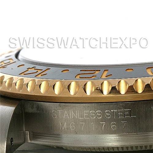 The image shows a close-up of the side of a Rolex GMT-Master 116713 Men's Stainless Steel Black Dial 116713 Men's Stainless Steel Black Dial watch, focusing on the stainless steel case and the bezel.