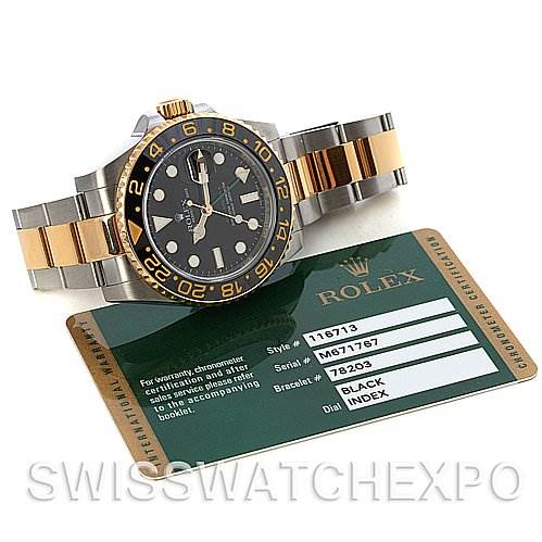 The image shows a Rolex GMT-Master 116713 Men's Stainless Steel Black Dial 116713 Men's Stainless Steel Black Dial watch at an angle highlighting its face and strap, alongside its certification card.