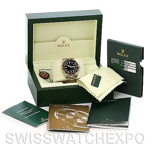 The image shows a Rolex GMT-Master 116713 Men's Stainless Steel Black Dial 116713 Men's Stainless Steel Black Dial model watch in its box along with manuals, a tag, and a cleaning cloth.