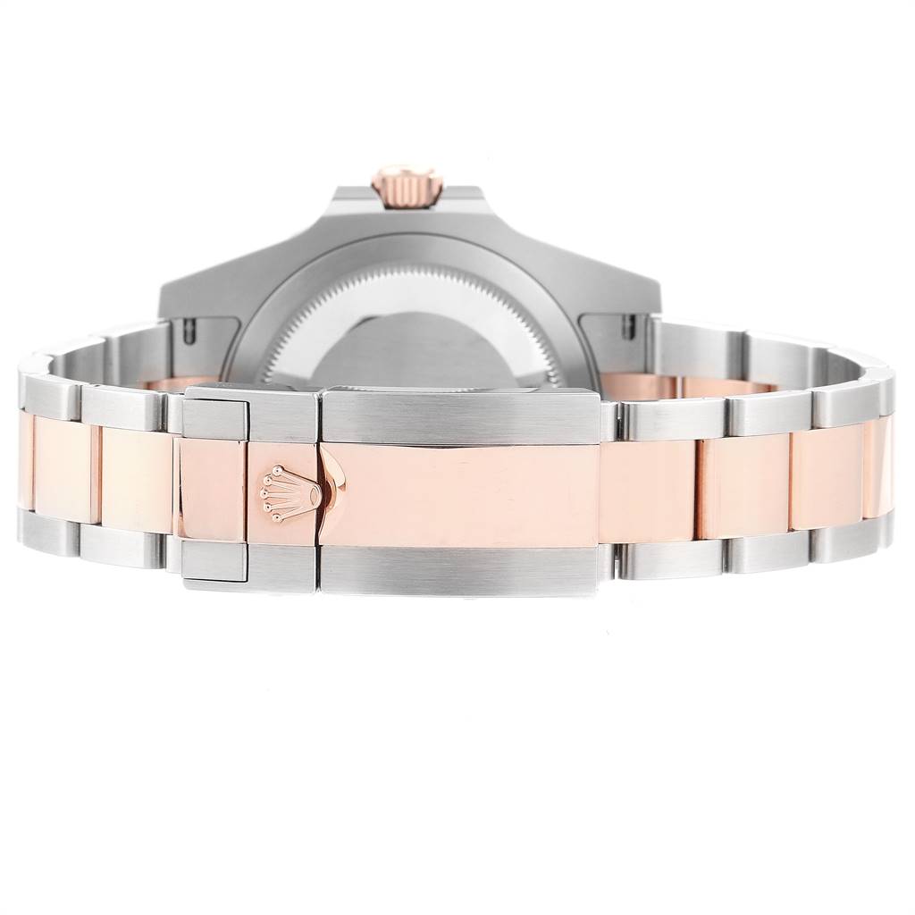 This image shows the back and bracelet clasp of a Rolex GMT-Master 126711 Men's Steel and Gold (two tone) Black Dial 126711 Men's Steel and Gold (two tone) Black Dial watch.