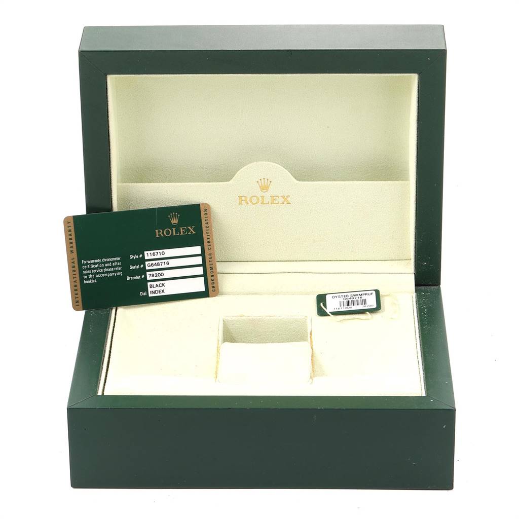 This image shows the open box and warranty card for a Rolex GMT-Master 116710 Men's Stainless Steel Black Dial 116710 Men's Stainless Steel Black Dial watch, with compartments and green branding.