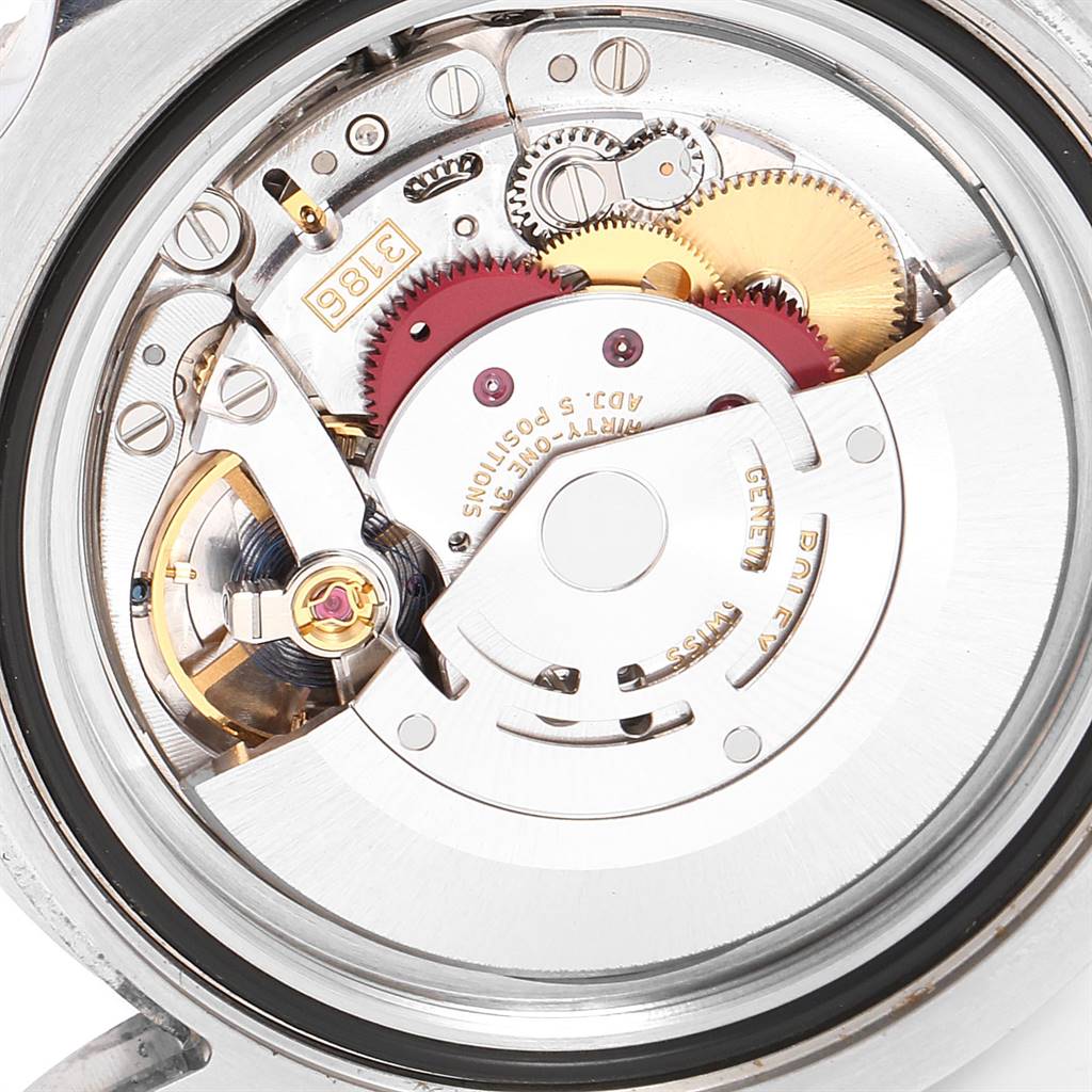 This image shows the internal mechanism of a Rolex GMT-Master 116710 Men's Stainless Steel Black Dial 116710 Men's Stainless Steel Black Dial watch from a straight-on angle.