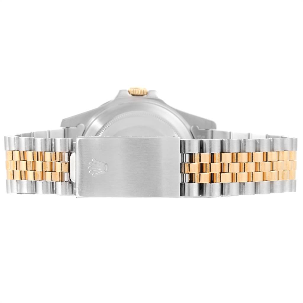 The image shows the back of a Rolex GMT-Master 16713 Men's Stainless Steel Brown Dial 16713 Men's Stainless Steel Brown Dial watch, focusing on the two-tone bracelet and clasp.