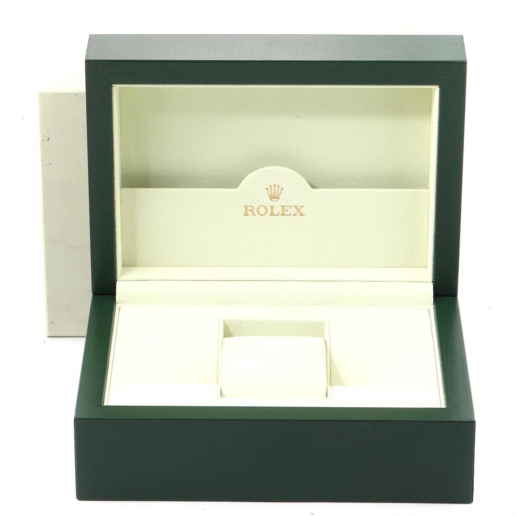 The image shows an open Rolex watch box for the GMT-Master model, featuring an empty cream-colored interior.