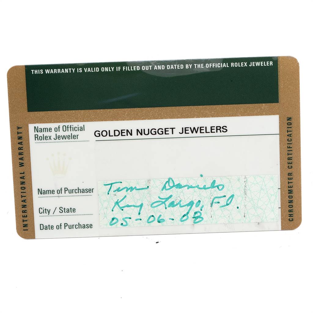 This image shows an international warranty card for a Rolex GMT-Master 116710 Men's Stainless Steel Black Dial 116710 Men's Stainless Steel Black Dial, including the jeweler's name and purchase details.