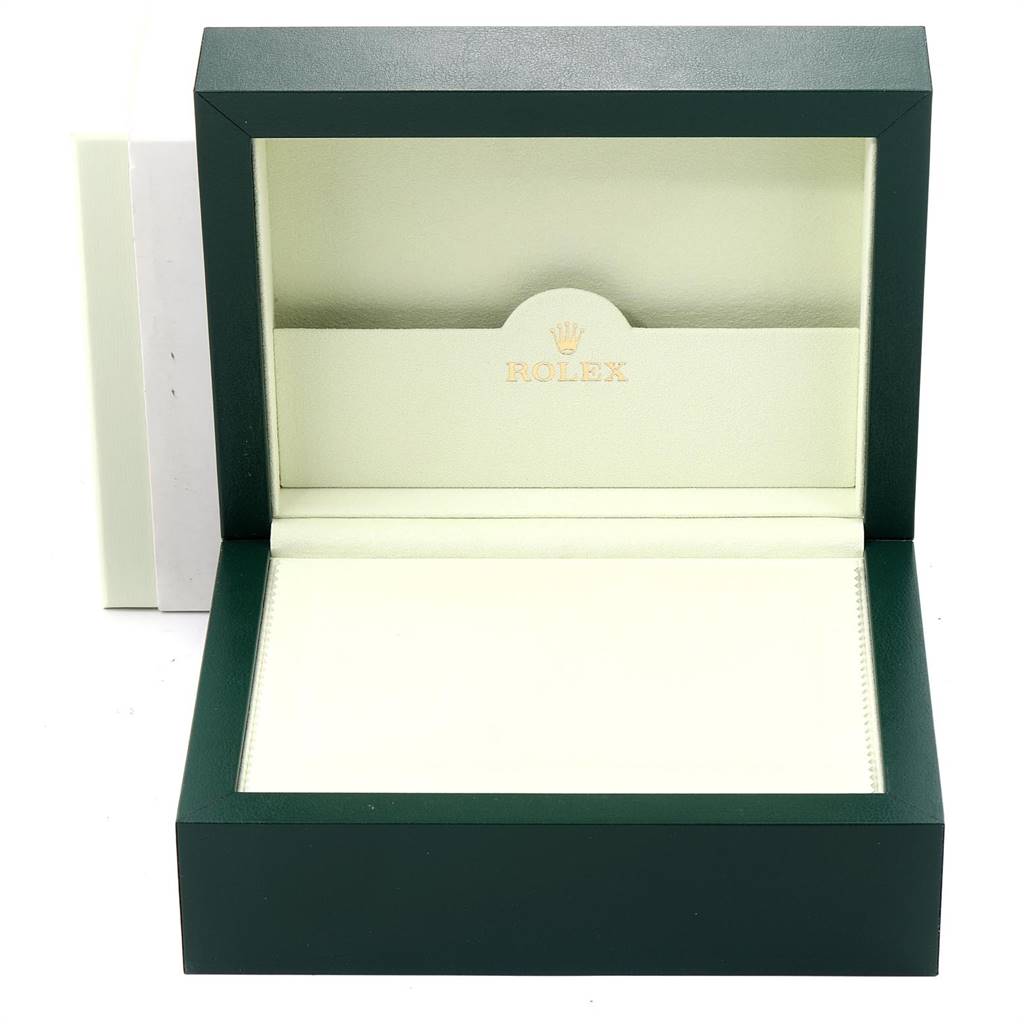 This image shows an empty Rolex GMT-Master 116710 Men's Stainless Steel Black Dial 116710 Men's Stainless Steel Black Dial watch box with its lid open.