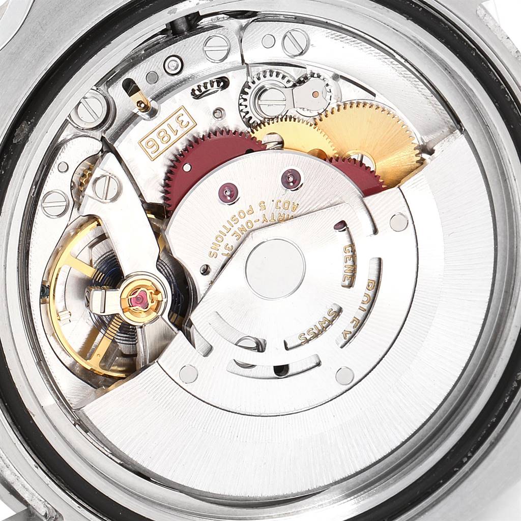 This image shows a close-up view of the movement and internal mechanical parts of a Rolex GMT-Master 116710 Men's Stainless Steel Black Dial 116710 Men's Stainless Steel Black Dial watch.