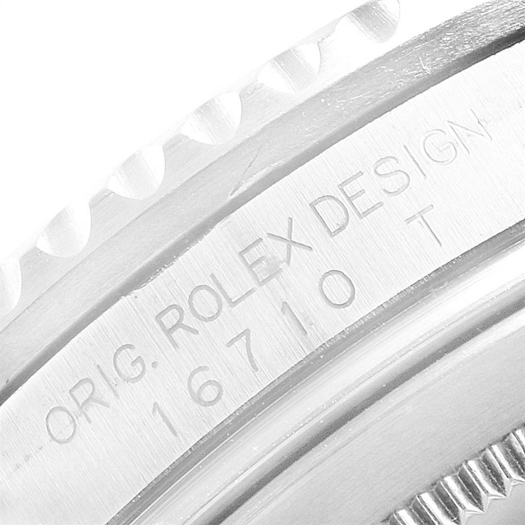 This image shows a close-up of the engraved case back of a Rolex GMT-Master 16710 Men's Stainless Steel Black Dial 16710 Men's Stainless Steel Black Dial, model number 16710.
