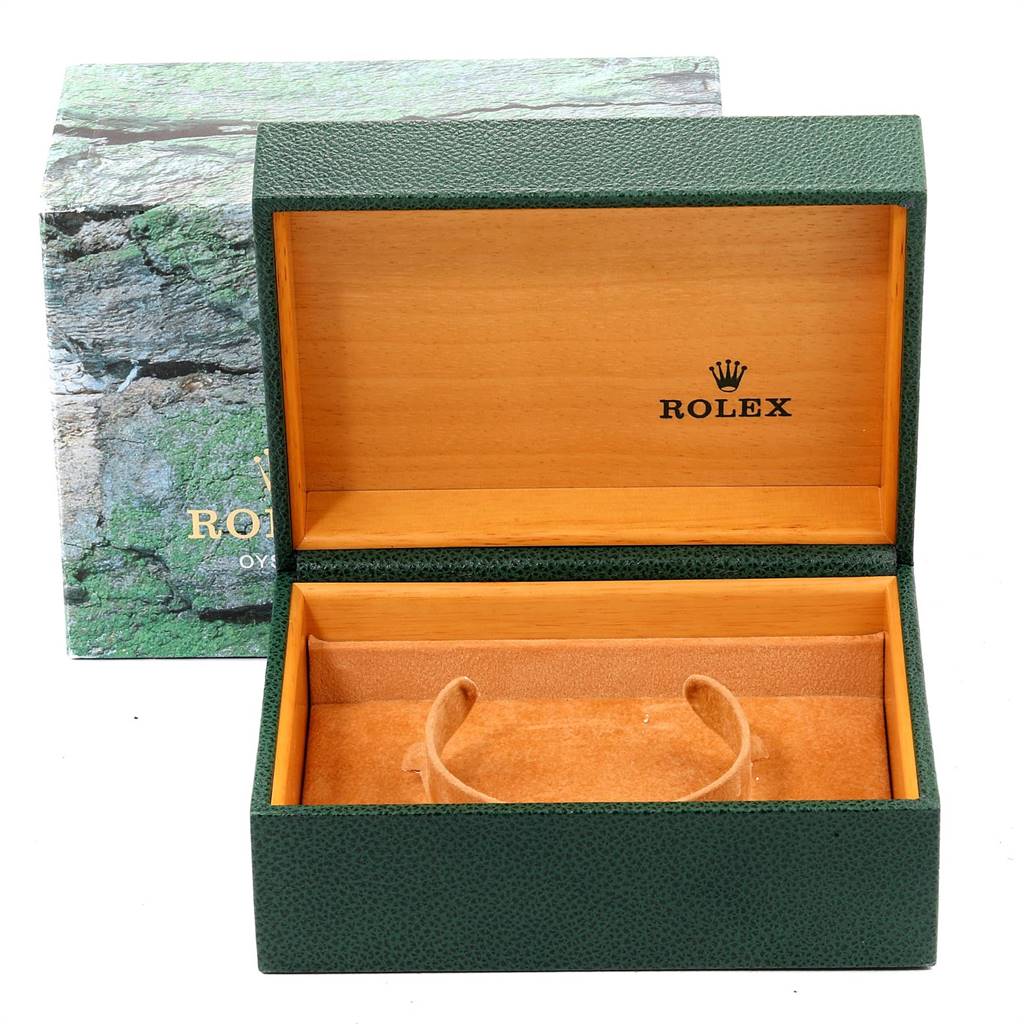 The image shows an open Rolex GMT-Master 16710 Men
s Stainless Steel Black Dial 16710 Men
s Stainless Steel Black Dial watch box, revealing the interior designed for holding the watch.