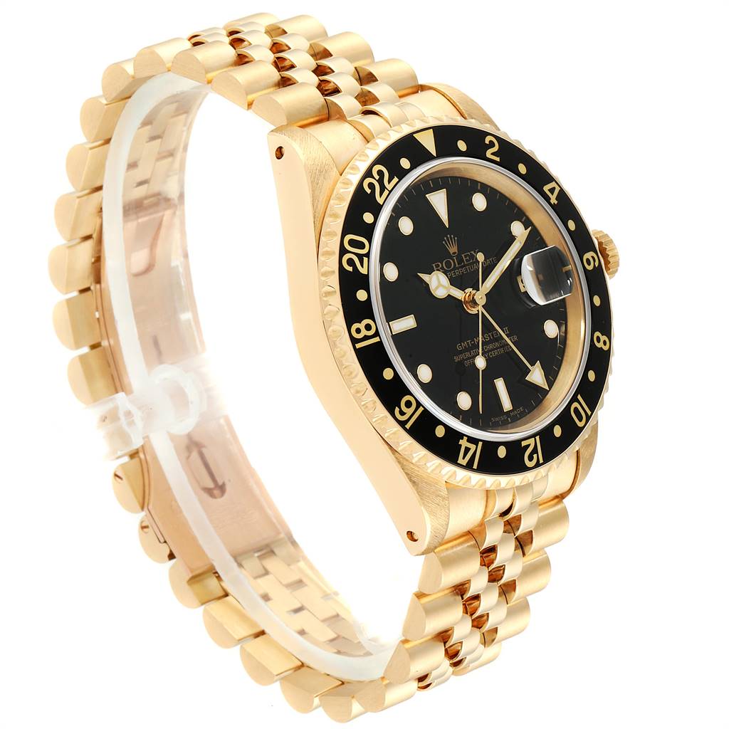 The image shows a Rolex GMT-Master 16718 Men's Yellow Gold Black Dial 16718 Men's Yellow Gold Black Dial watch from a side angle, highlighting the face, bezel, crown, and bracelet.
