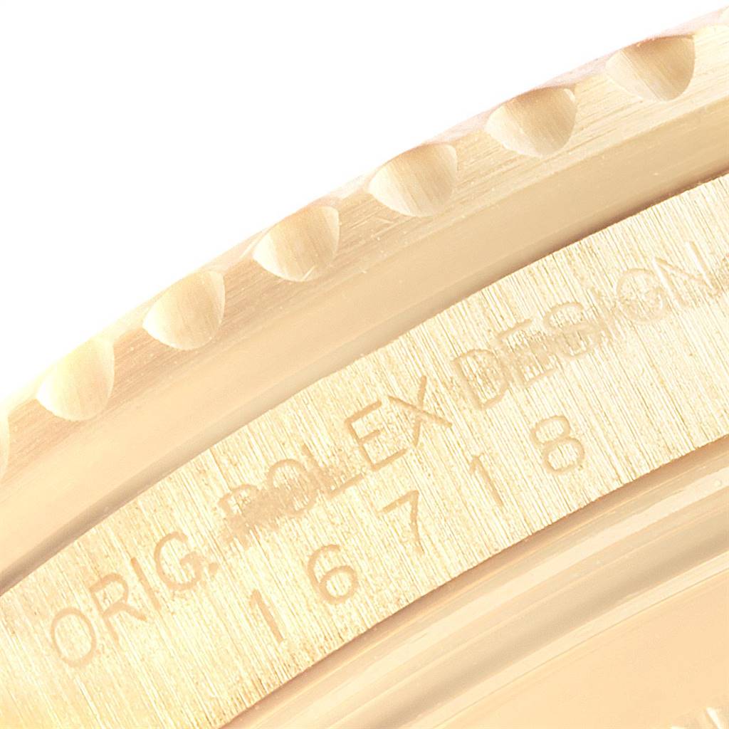 The image shows a close-up view of the case and bezel of a Rolex GMT-Master 16718 Men's Yellow Gold Black Dial 16718 Men's Yellow Gold Black Dial model, highlighting the reference number 16718.