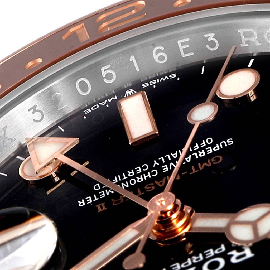 The image shows a close-up of the dial and bezel of a Rolex GMT-Master 126711 Men's Steel and Gold (two tone) Black Dial 126711 Men's Steel and Gold (two tone) Black Dial model, focusing on the hands and part of the hour markers.