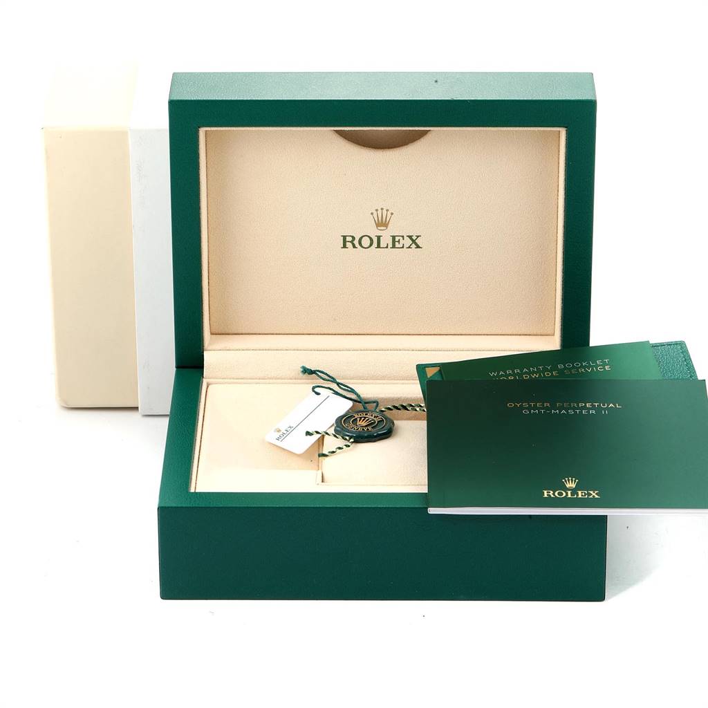The image shows the open box for a Rolex GMT-Master 126711 Men's Steel and Gold (two tone) Black Dial 126711 Men's Steel and Gold (two tone) Black Dial model, including warranty booklet, service booklet, tag, and identification card.