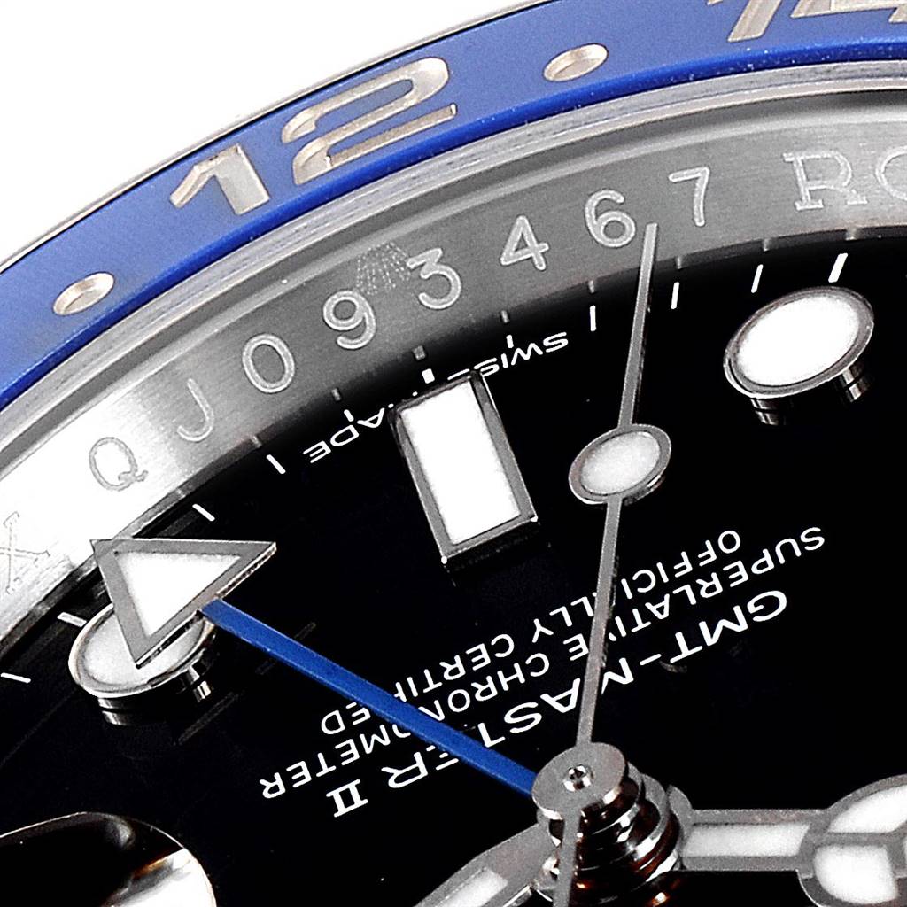 This close-up image shows the dial, hands, and partial bezel of a Rolex GMT-Master 116710 Men's Stainless Steel Black Dial 116710 Men's Stainless Steel Black Dial II watch.