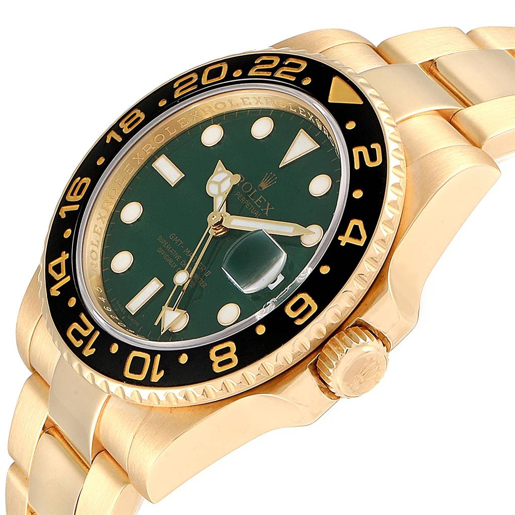 The image shows a close-up angle of a Rolex GMT-Master 116718 Men's Yellow Gold Green Dial 116718 Men's Yellow Gold Green Dial watch, highlighting its green dial, bezel, crown, and part of the bracelet.