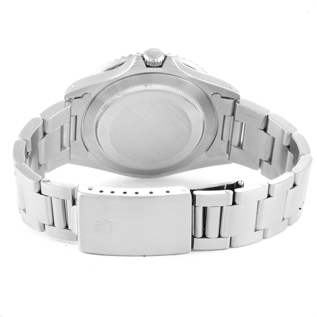 This image shows the back case and the clasp of a Rolex GMT-Master 16700 Men's Stainless Steel Black Dial 16700 Men's Stainless Steel Black Dial watch at a slight angle.