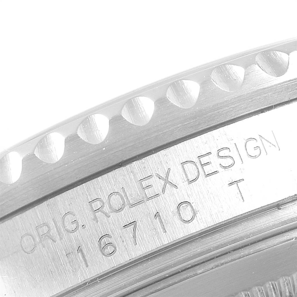 This image shows a close-up of the case side and bezel of a Rolex GMT-Master 16710 Men's Stainless Steel Black Dial 16710 Men's Stainless Steel Black Dial, model number 16710.