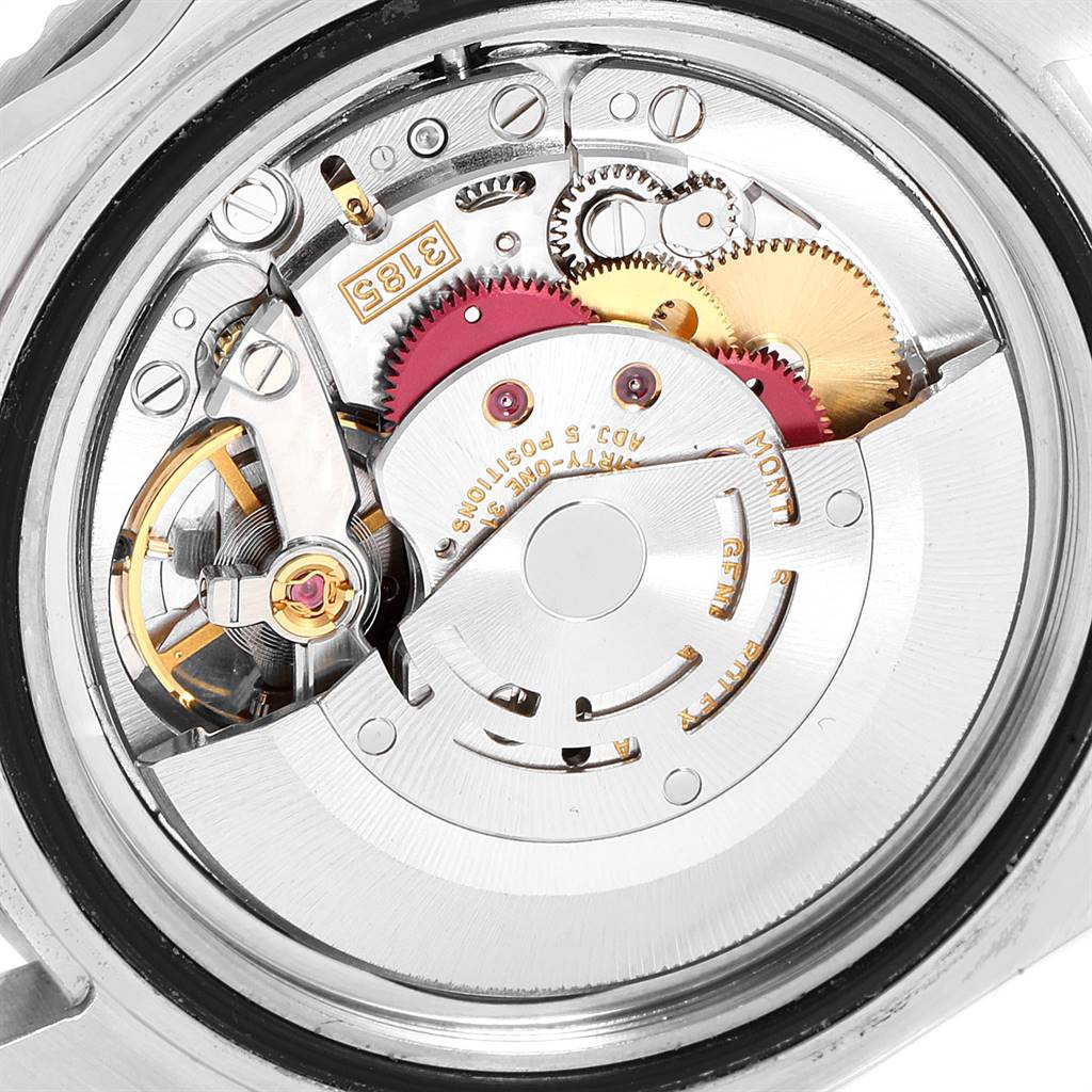 The image shows the movement mechanism of a Rolex GMT-Master 16710 Men
s Stainless Steel Black Dial 16710 Men
s Stainless Steel Black Dial watch from a close-up, internal angle.