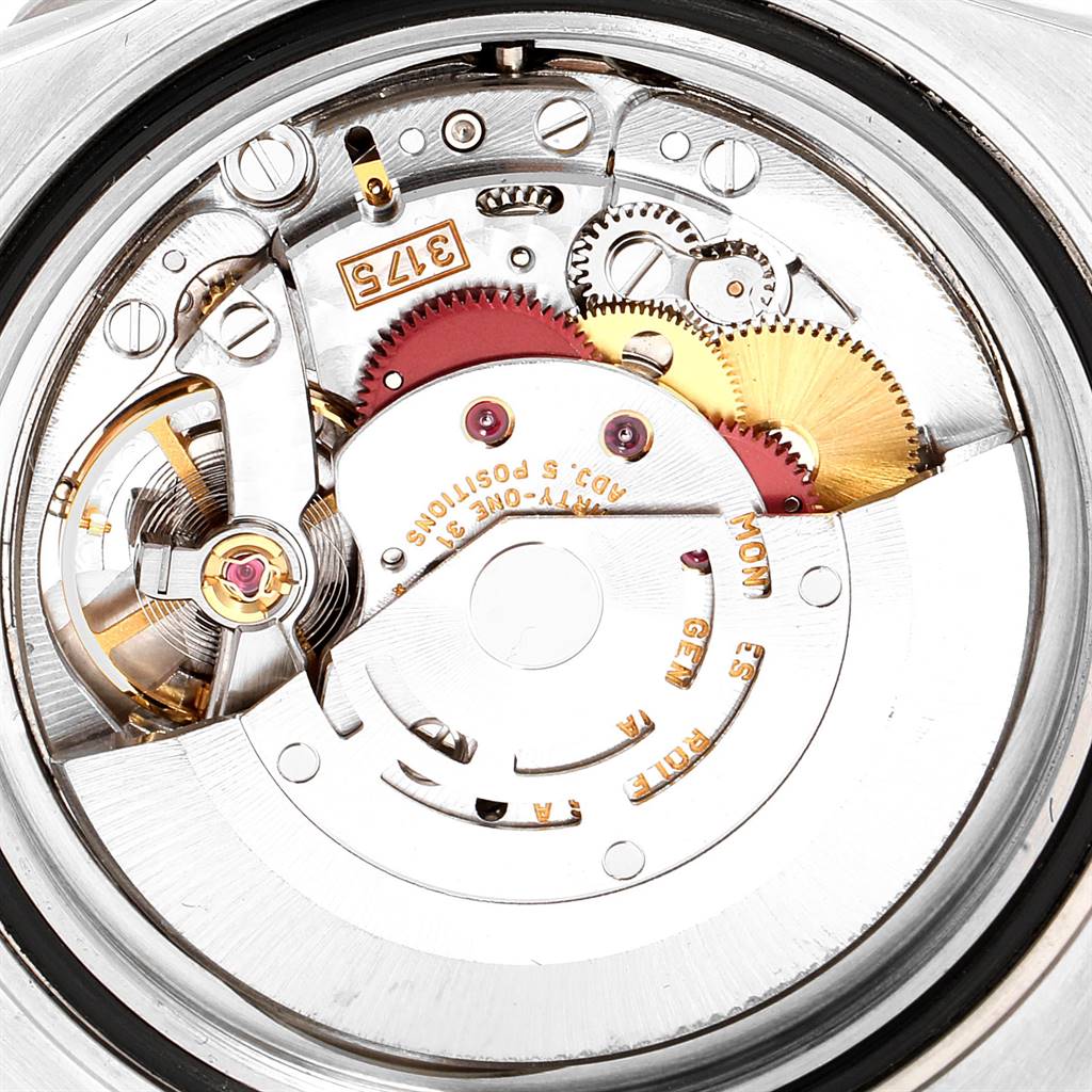 This close-up image shows the internal mechanical movement of the Rolex GMT-Master 16700 Men's Stainless Steel Black Dial 16700 Men's Stainless Steel Black Dial watch.