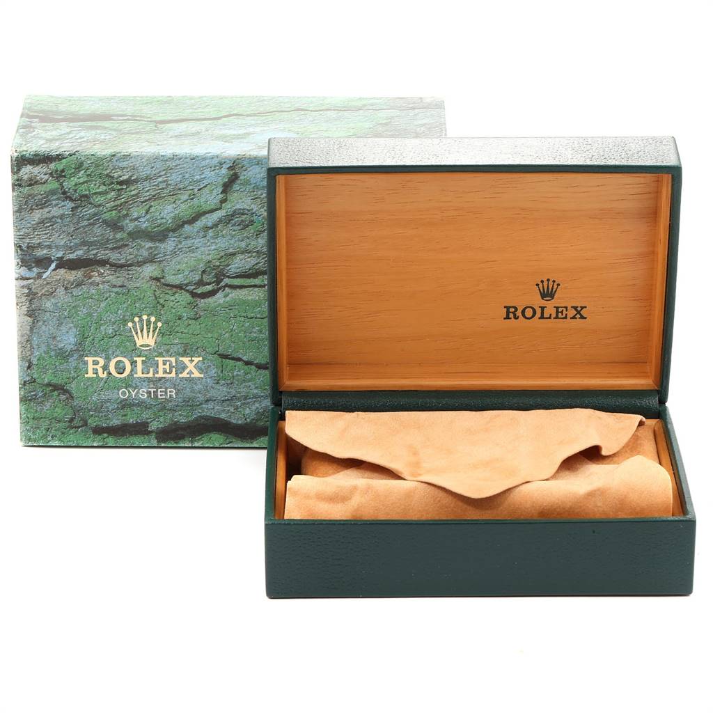 The image shows an open Rolex GMT-Master 16700 Men's Stainless Steel Black Dial 16700 Men's Stainless Steel Black Dial watch box with a tan cloth inside, and the outer box in the background.