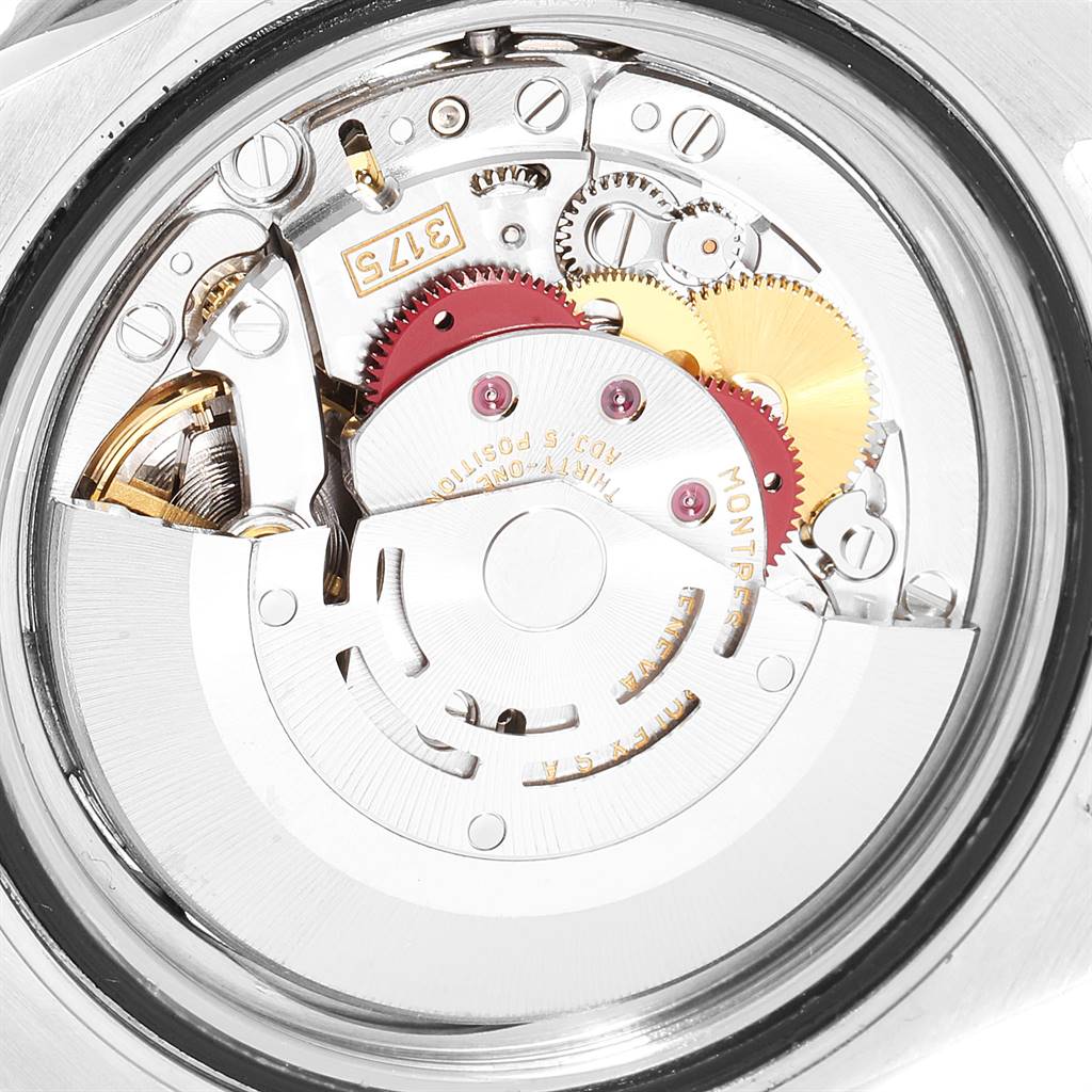 This image shows the internal mechanism and movement of the Rolex GMT-Master 16700 Men's Stainless Steel Black Dial 16700 Men's Stainless Steel Black Dial watch from a rear angle.