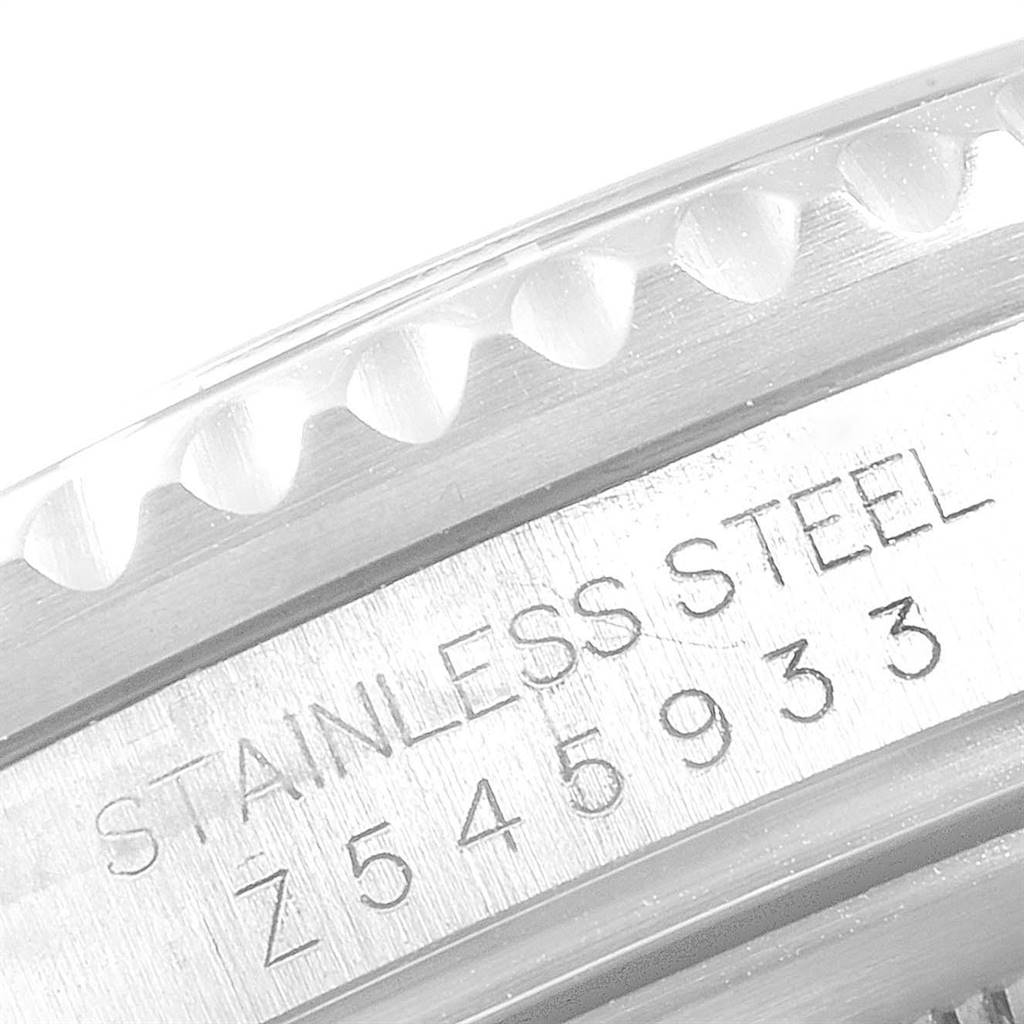 This image shows a close-up of the engraved serial number and stainless steel detail on a Rolex GMT-Master 16710 Men's Stainless Steel Black Dial 16710 Men's Stainless Steel Black Dial watch.