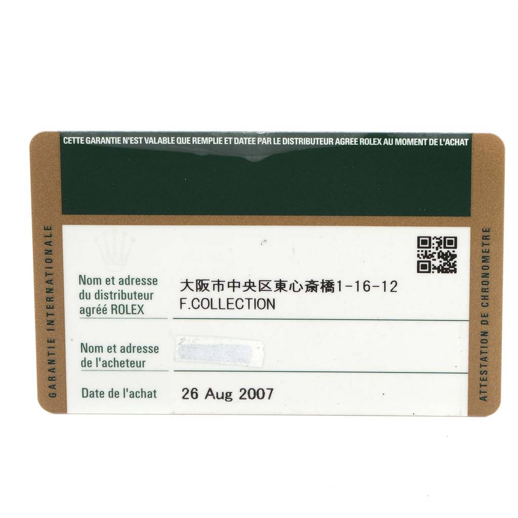 This image shows the international guarantee card for the Rolex GMT-Master 16710 Men's Stainless Steel Black Dial 16710 Men's Stainless Steel Black Dial, with details of the distributor and purchase date.