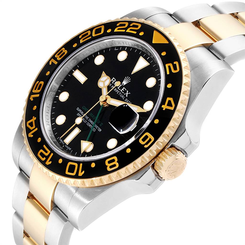 This Rolex GMT-Master 116713 Men's Stainless Steel Black Dial 116713 Men's Stainless Steel Black Dial watch is viewed at a three-quarter angle, showing its black dial, two-tone bezel, and bracelet with gold center links.