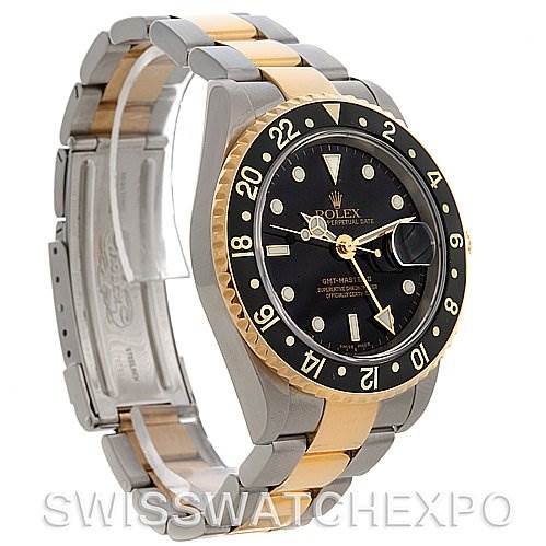 The image shows a Rolex GMT-Master 16713 Men's Stainless Steel Black Dial 16713 Men's Stainless Steel Black Dial watch from an angled side view, highlighting the bezel, dial, bracelet, and clasp.