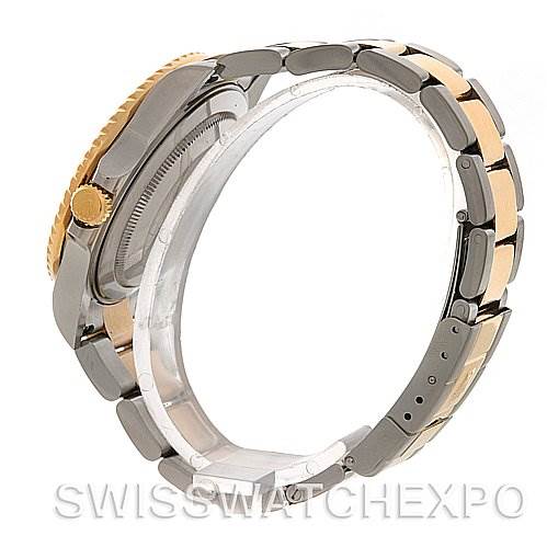 This image shows a side view of a Rolex GMT-Master 16713 Men's Stainless Steel Black Dial 16713 Men's Stainless Steel Black Dial watch, highlighting the case, crown, and part of the bracelet.