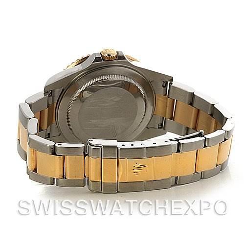 This image shows the back case and bracelet of a Rolex GMT-Master 16713 Men's Stainless Steel Black Dial 16713 Men's Stainless Steel Black Dial watch, highlighting its two-tone metal design.