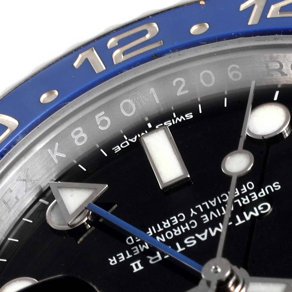 The image shows a close-up of the Rolex GMT-Master 116710 Men's Stainless Steel Black Dial 116710 Men's Stainless Steel Black Dial II watch face, highlighting the hour markers, hands, and part of the blue bezel.